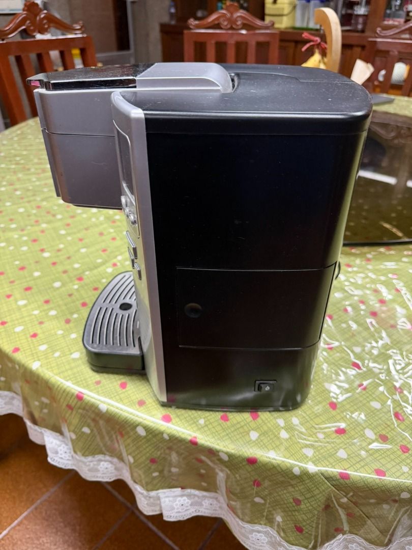Cuisinart Keurig Coffee Maker (Category: Coffee Machines & Makers) located in Makati City. Submitted by kpesengco (Listing ID 1424986296, Image 3). Description: Keurig coffee maker features a water reservoir and a brew button. It has a silver and black color scheme. The coffee maker has a drip tray and a digital display. The power cord is included..