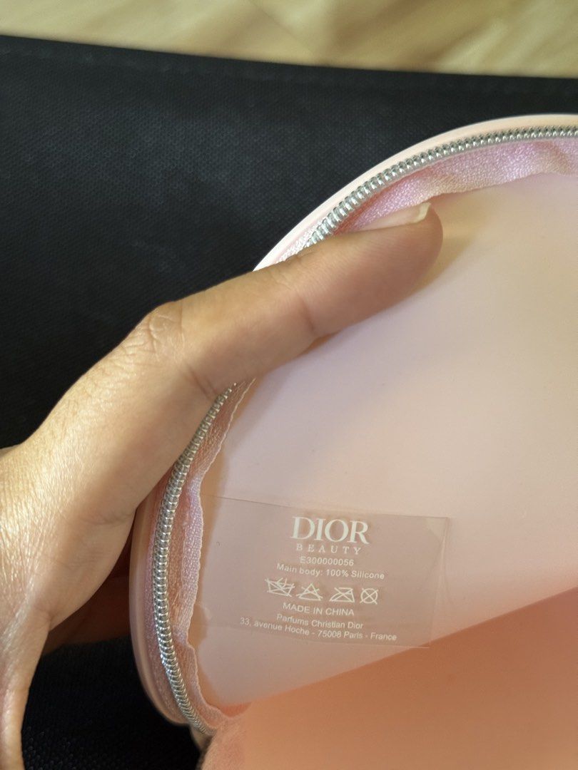 Dior Pink Cosmetic Pouch (Category: Luxury Bags & Wallets) located in Mabalacat. Submitted by heyizaaa (Listing ID 1424912793, Image 3). Description: Brandnew Dior Pouch with Box Can be a clutch or vanity bag. Fits a lot! A little bit bigger than my hand From Canada 🇨🇦.