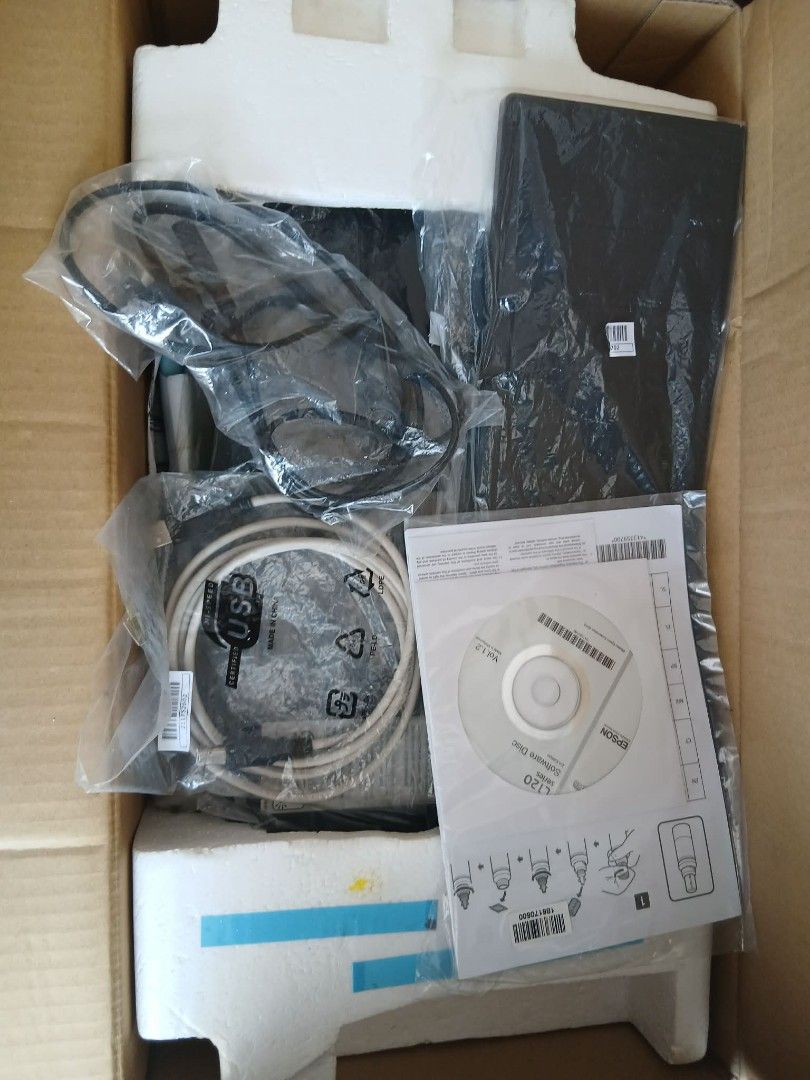 Epson EcoTank L121 Printer Black Ink Issue (ALMOST NEW) (Category: Printers, Scanners & Copiers) located in Tanauan. Submitted by jeuskingz (Listing ID 1425051477, Image 3). Description: Epson EcoTank L121 printer. Includes complete accessories the original box, ink bottles, USB cable, and software CD. The printer is black. The print quality test shows some lines missing. black ink issue the rest all work powerflush ink lng daw need kayo na sumub