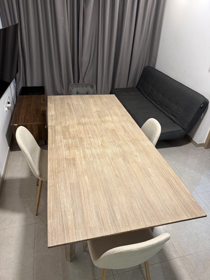 Extendable Dining Table (Category: Tables & Sets) located in Singapore. Submitted by platwav (Listing ID 1424889380, Image 3). Description: 1.6m and extendable to 2m 90cm width Neutral colour tone Solid acacia wood Easy maintenance Long lasting and durable Antibacterial Water resistant Only 2 months of light usage .