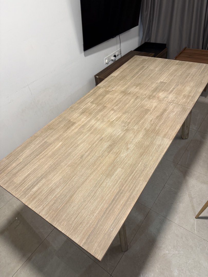 Extendable Dining Table (Category: Tables & Sets) located in Singapore. Submitted by platwav (Listing ID 1424889380, Image 2). Description: 1.6m and extendable to 2m 90cm width Neutral colour tone Solid acacia wood Easy maintenance Long lasting and durable Antibacterial Water resistant Only 2 months of light usage .