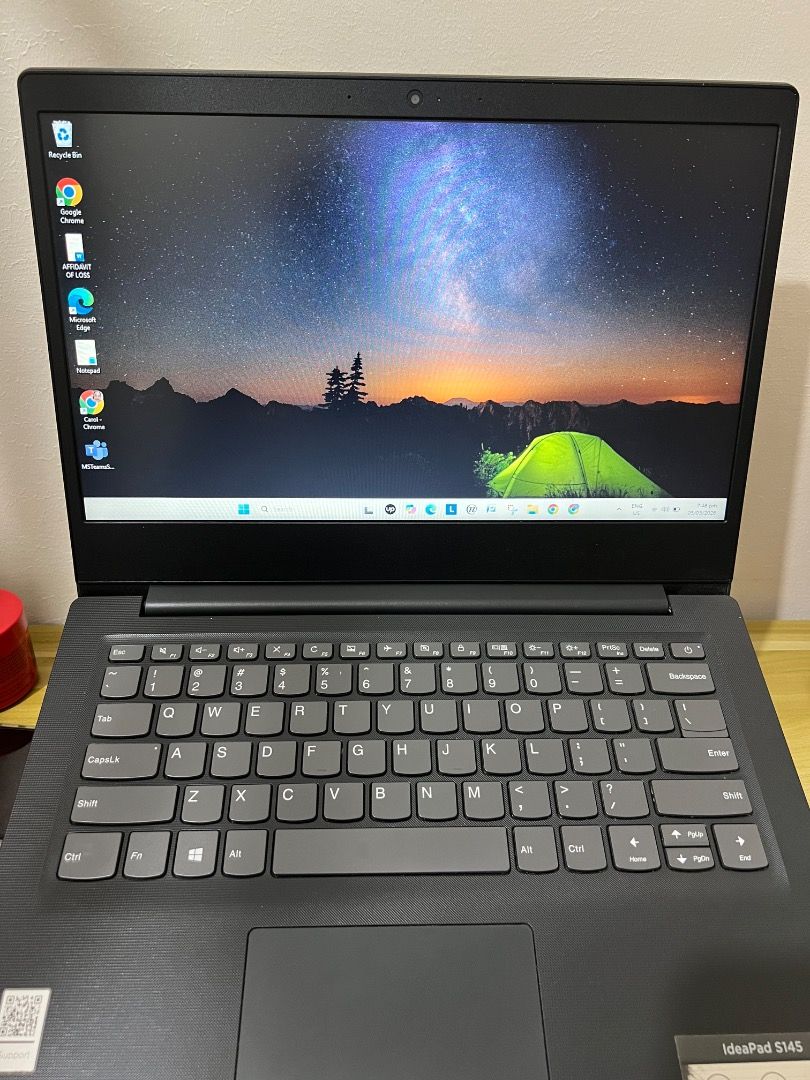 Lenovo IdeaPad S145 Laptop (Category: Laptops & Notebooks) located in San Jose. Submitted by annieblancovargas3812 (Listing ID 1424909445, Image 3). Description: Lenovo IdeaPad S145 laptop with charger and Lenovo bag. Features an Intel Core i5-1035G4 CPU, 20GB RAM, and 477GB storage. Includes a built-in webcam. The laptop is black..