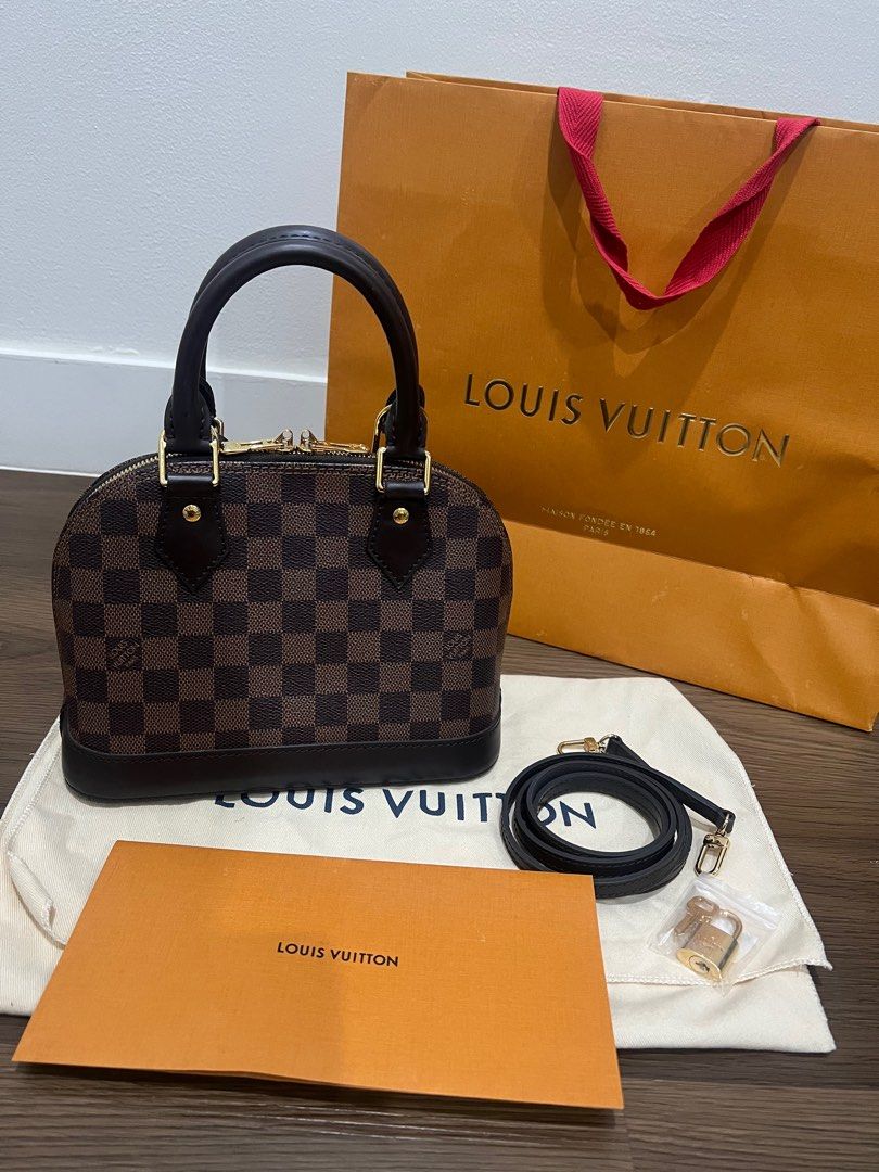 LV Alma BB Damier Ebene Canvas (Category: Luxury Bags & Wallets) located in Davao. Submitted by mslbt (Listing ID 1424935961, Image 2). Description: A classic and timeless luxury piece that never goes out of style✨ ☑️ complete Inclusions: store receipt, paperbag, dust bag, strap, lock & keys •(barely used) still in very good condition •No flaws, only minor signs of usage. All photos posted already so you can check Shipping via LBC only Meet up: D