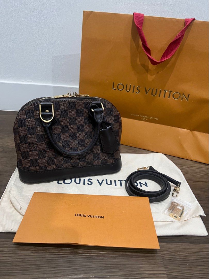 LV Alma BB Damier Ebene Canvas (Category: Luxury Bags & Wallets) located in Davao. Submitted by mslbt (Listing ID 1424935961, Image 1). Description: A classic and timeless luxury piece that never goes out of style✨ ☑️ complete Inclusions: store receipt, paperbag, dust bag, strap, lock & keys •(barely used) still in very good condition •No flaws, only minor signs of usage. All photos posted already so you can check Shipping via LBC only Meet up: D
