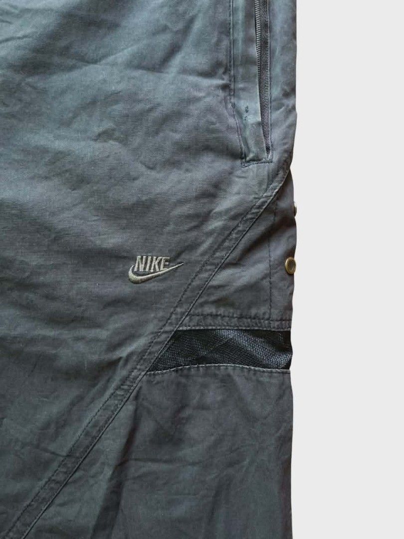 Nike Clima-Fit Shorts XXL (Category: Shorts) located in Manila. Submitted by dulthriftcollection3 (Listing ID 1424934121, Image 3). Description: Nike Clima-Fit shorts in black. Features a drawstring waist, side pockets, and a small Nike logo. The shorts have a mesh detail on the side. The size is XXL. Made in Hong Kong and Vietnam..