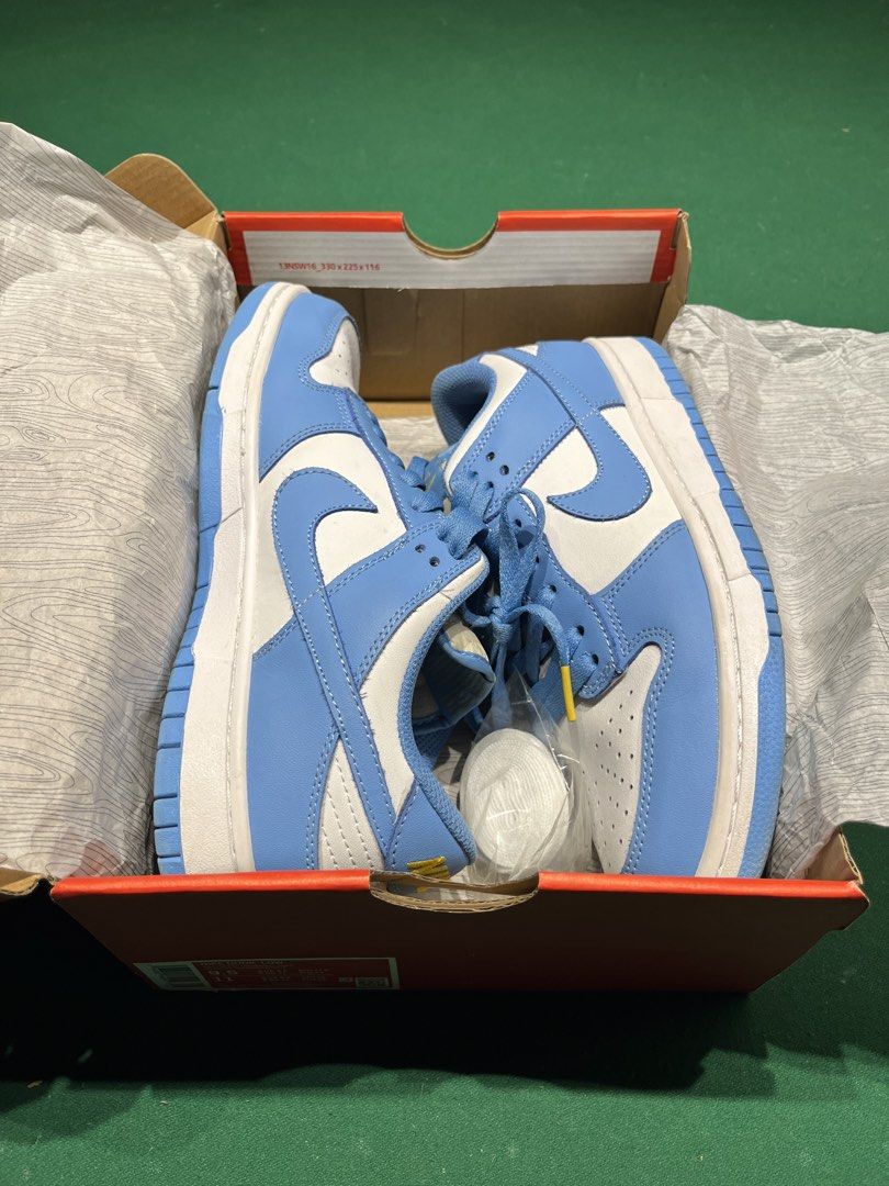Nike Dunk Low UNC Sail (Category: Sneakers) located in Mandaluyong City. Submitted by migzestrada (Listing ID 1425030060, Image 1). Description: Nike Dunk Low in Sail/Coast UNC. Comes with the original box and extra laces. 9/10 Condition.