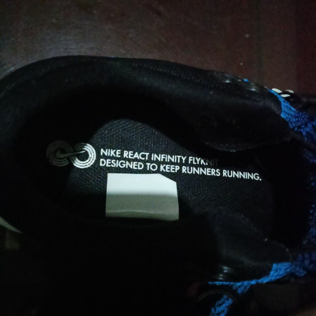 Nike React Infinity Flyknit Running Shoes - Blue (Category: Sneakers) located in Penaranda. Submitted by flipmopickmo (Listing ID 1424985016, Image 3). Description: Nike React Infinity Flyknit running shoes in blue and black. Features a white sole and black laces. The size is US 8.5. The model number is CT2357-400. Designed to keep runners running. Made in Vietnam..