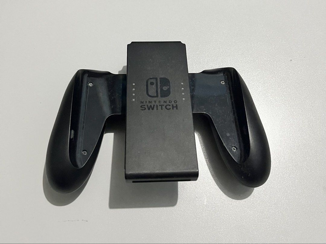 Nintendo Switch “Joycon Holder Controller” (Category: Controllers) located in Quezon City. Submitted by pwrproductions (Listing ID 1425002260, Image 1). Description: .