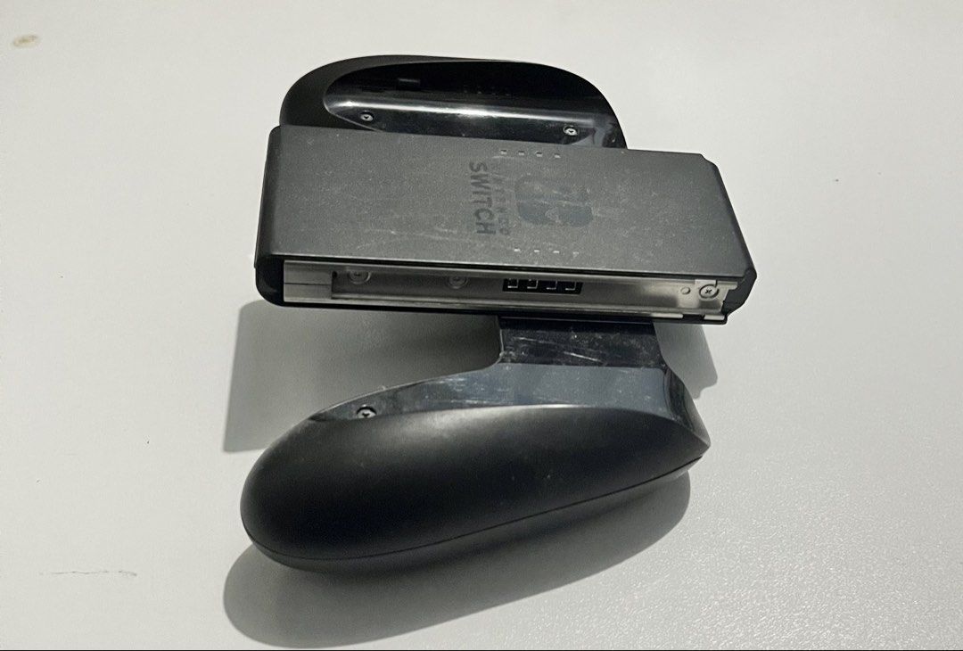 Nintendo Switch “Joycon Holder Controller” (Category: Controllers) located in Quezon City. Submitted by pwrproductions (Listing ID 1425002260, Image 3). Description: .