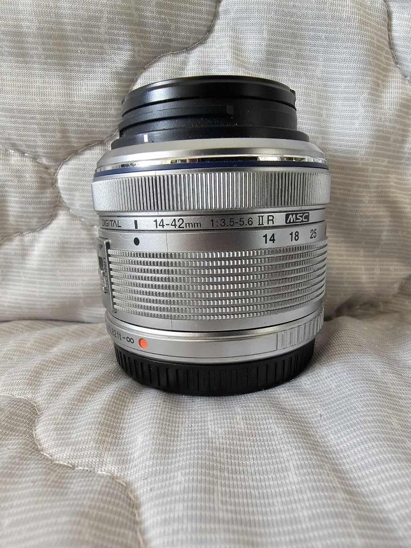 Olympus OM-D Camera with Multiple Lenses (Category: Cameras) located in Manila. Submitted by autumntreasures (Listing ID 1425038966, Image 3). Description: FS: Olympus OM-D E-M10 MKI + lenses FS: Olympus OM-D E-M10 (Mark I) Inclusion: Unit (no issues but with signs of usage see pictures) Shot-count: 11,756+ 2 x Original Battery Original Charger Gariz Strap Longstrap Olympus FL36R Olympus 14-42mm kit lens silver FREE Olympus 14-42mm pancake kit si