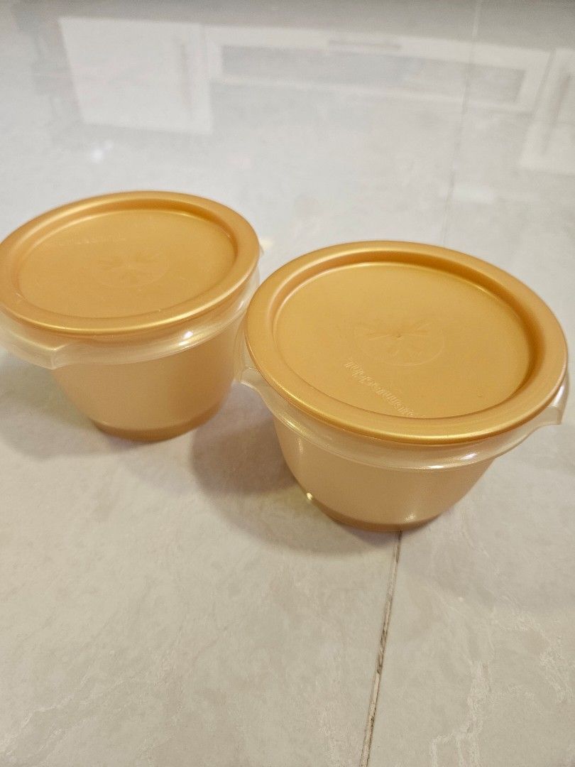 One Touch Tupperware gold canisters