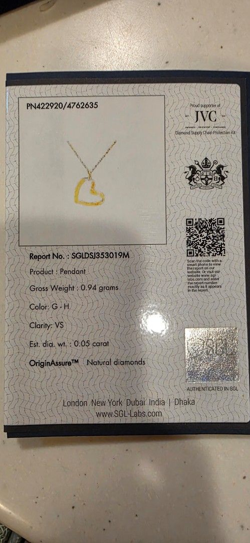Open Heart Pendant Diamond Necklace (Category: Necklaces) located in Manila. Submitted by cher0918 (Listing ID 1424974238, Image 2). Description: - Gold chain necklace with heart-shaped diamond pendant - Includes JVC certificate of authenticity k18 japan gold - 0.05 carat - Color: G-H - Clarity: VS - Gross Weight: 0.94 grams - Comes with original box.