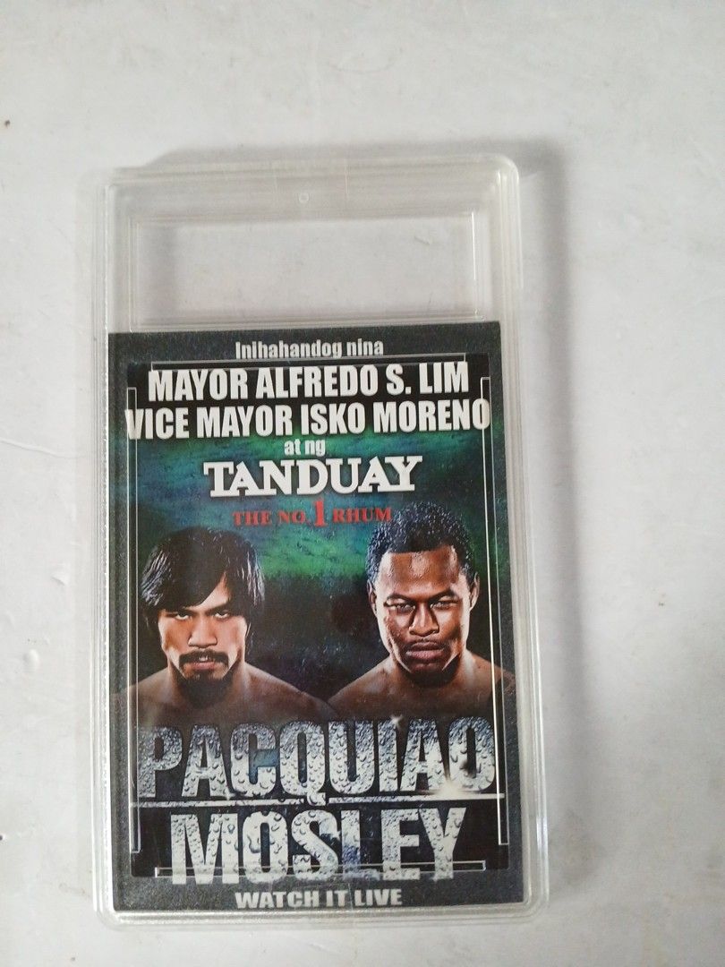 Pacquiao Mosley Tanduay ticket (Category: Vintage Collectibles) located in Manila. Submitted by diczenestr94951 (Listing ID 1424896506, Image 1). Description: Boxing ticket - Features Pacquiao vs. Mosley boxing match - Includes Tanduay logo - Encased in a protective holder.