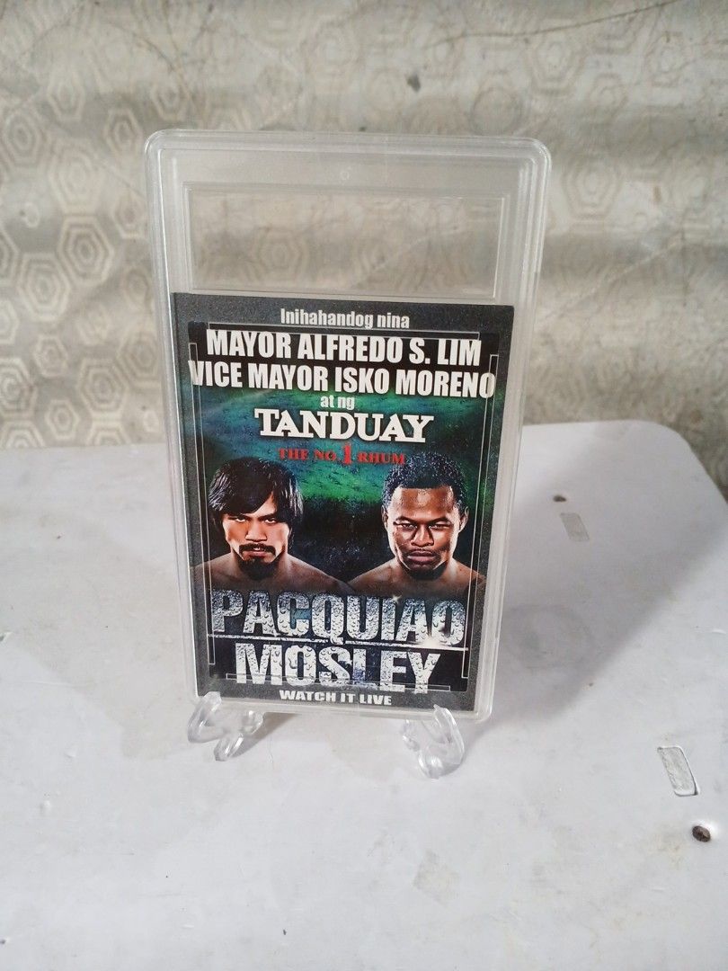 Pacquiao Mosley Tanduay ticket (Category: Vintage Collectibles) located in Manila. Submitted by diczenestr94951 (Listing ID 1424896506, Image 3). Description: Boxing ticket - Features Pacquiao vs. Mosley boxing match - Includes Tanduay logo - Encased in a protective holder.