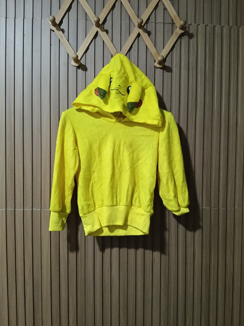 Pikachu Hoodie (Category: Babies & Kids Fashion) located in Bacolod City. Submitted by MiggysKidswearCollections (Listing ID 1424977924, Image 2). Description: Location Deca Homes South Brgy Cabug Bacolod City Shipping nationwide thru Flashxpress add 75 sf size Medium 6-7 yrs old ‼️ PLEASE DO NOT OFFER IF YOU ARE NOT SURE BUYER, RESPECT SELLER'S TIME & EFFORT ‼️ Yellow Pikachu hoodie. Features a hood with Pikachu's face and ears. Includes a tail 