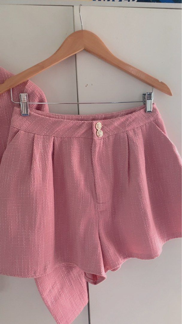 Pink Tweed Blazer and Shorts Set (Category: Sets or Coordinates) located in Cavite. Submitted by mommyb3 (Listing ID 1424978172, Image 2). Description: Small-Medium short waistline 27-29 Stylish pink tweed blazer and shorts set. The blazer features a cropped design with gold buttons. The shorts have a high-waisted fit. Perfect for a chic and coordinated look. Great for both casual and semi-formal occasions..