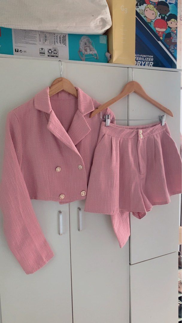 Pink Tweed Blazer and Shorts Set (Category: Sets or Coordinates) located in Cavite. Submitted by mommyb3 (Listing ID 1424978172, Image 1). Description: Small-Medium short waistline 27-29 Stylish pink tweed blazer and shorts set. The blazer features a cropped design with gold buttons. The shorts have a high-waisted fit. Perfect for a chic and coordinated look. Great for both casual and semi-formal occasions..