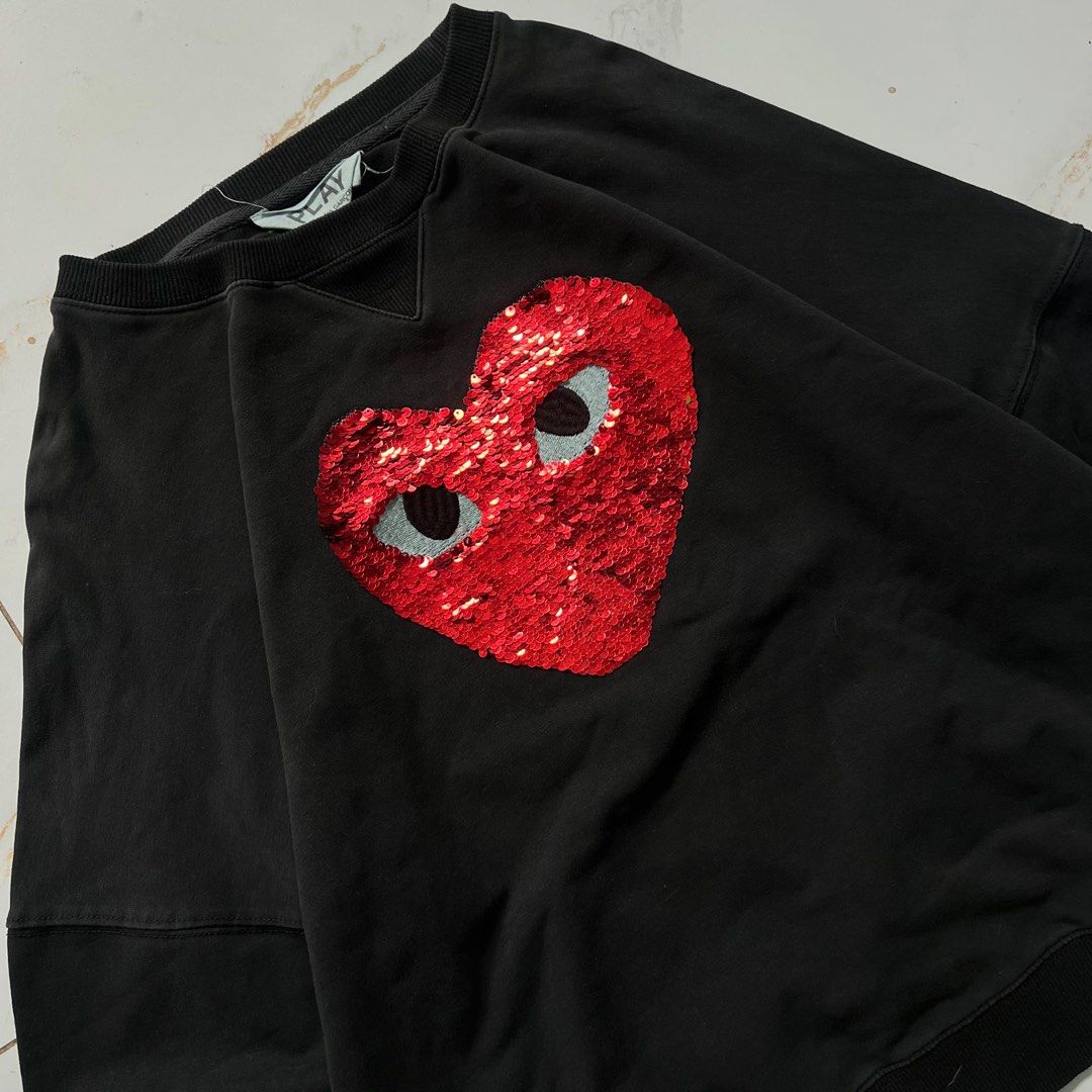 Play Comme des Garcons Sequin Heart Sweatshirt (Category: Coats, Jackets and Outerwear) located in Manila. Submitted by ricszsthrift (Listing ID 1425056894, Image 3). Description: W-23 L-23(almost) boxy fit 9/10 CONDITION 9/10 COLOR RATE .