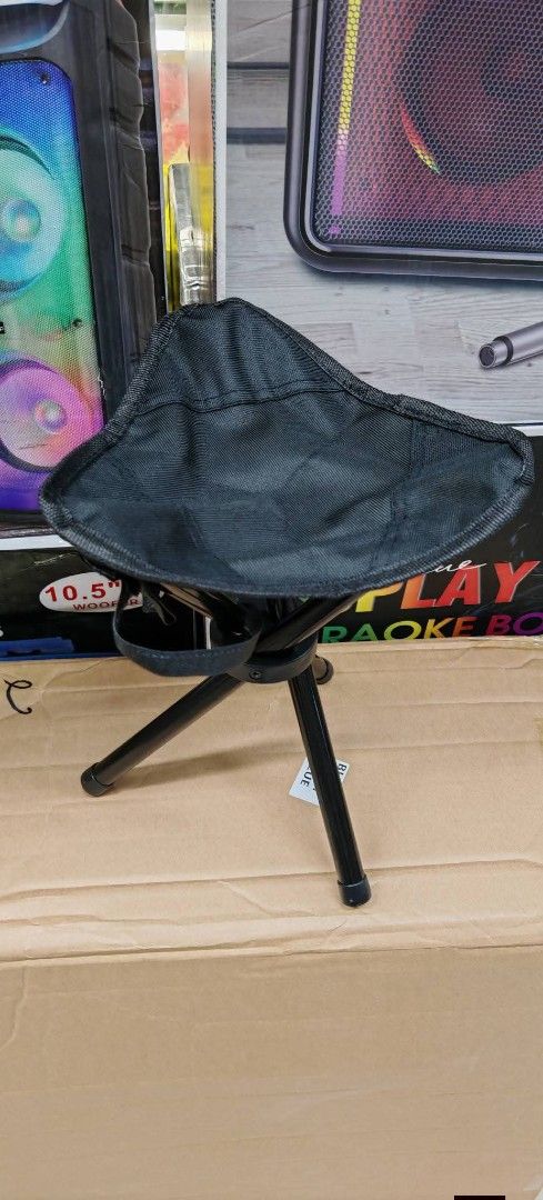 Portable Stool - Black (Category: Chairs) located in Manila. Submitted by yzlshop (Listing ID 1424895635, Image 1). Description: Portable tripod stool is perfect for outdoor activities. It features a black seat and legs, and it folds up for easy storage and transport. The stool is lightweight and compact, making it ideal for camping, fishing, or any other outdoor adventure. It's a convenient seating solution for on-the-go..