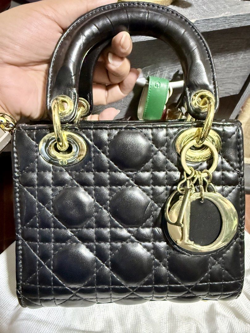 (PROJECT BAG) Dior Lady Dior Mini Bag Black (Category: Luxury Bags & Wallets) located in Cavite. Submitted by lady_speculator_ph (Listing ID 1425050257, Image 2). Description: Hey, ladies! Check out this stunning Lady Dior Mini Bag in classic black! It's a timeless piece that will elevate any outfit. As you can see in the photos, it's been pre-loved, but still has a lot of life left. Perfect for those who appreciate luxury and style. 👀 Please ch