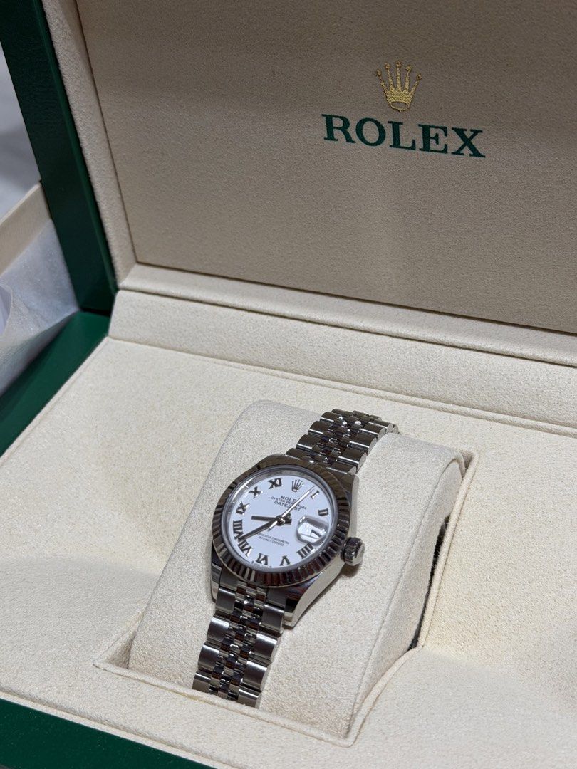 Rolex Datejust White Dial (Category: Luxury Watches) located in Quezon City. Submitted by lebasi0704 (Listing ID 1424936593, Image 1). Description: Rolex Lady Datejust 28mm Steel White Roman Dial Jubilee 279174 Unit, box, certificate of authentication.