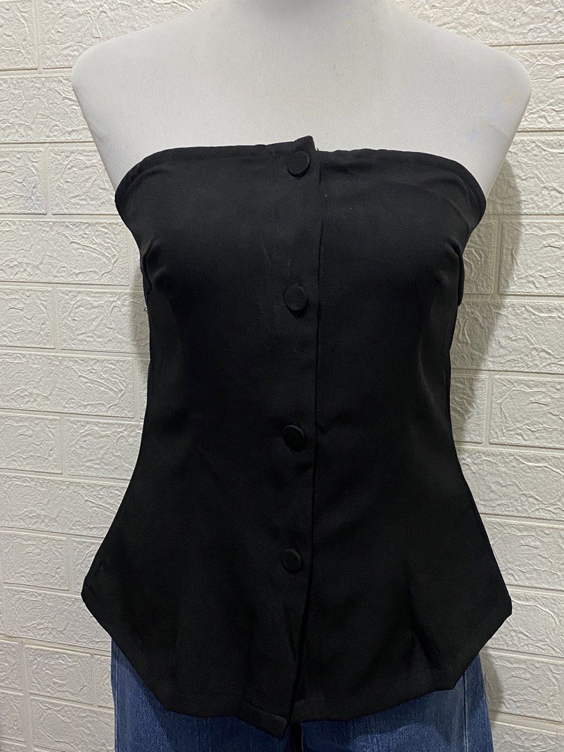 SHEIN Black Tube Top with Buttons (Category: Others Tops) located in Manila. Submitted by anneeem (Listing ID 1424918372, Image 2). Description: - Size Large on Tag (reco for semi-large only) - Black tube top - Button-down design - Fitted silhouette - Peplum hem - Elastic back for secure fit - Dress up or down.