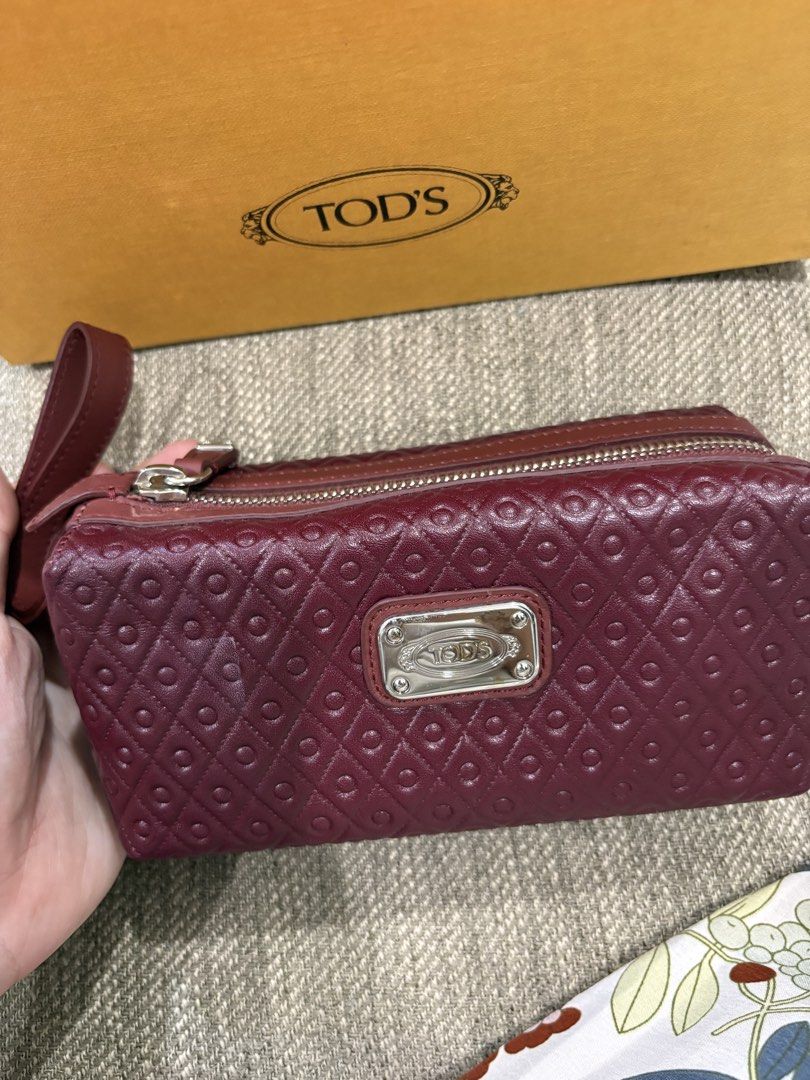 Tod's Quilted Leather Clutch (Category: Luxury Bags & Wallets) located in Manila. Submitted by sarahdeclutters88 (Listing ID 1424921021, Image 3). Description: Never used With box and pouch.