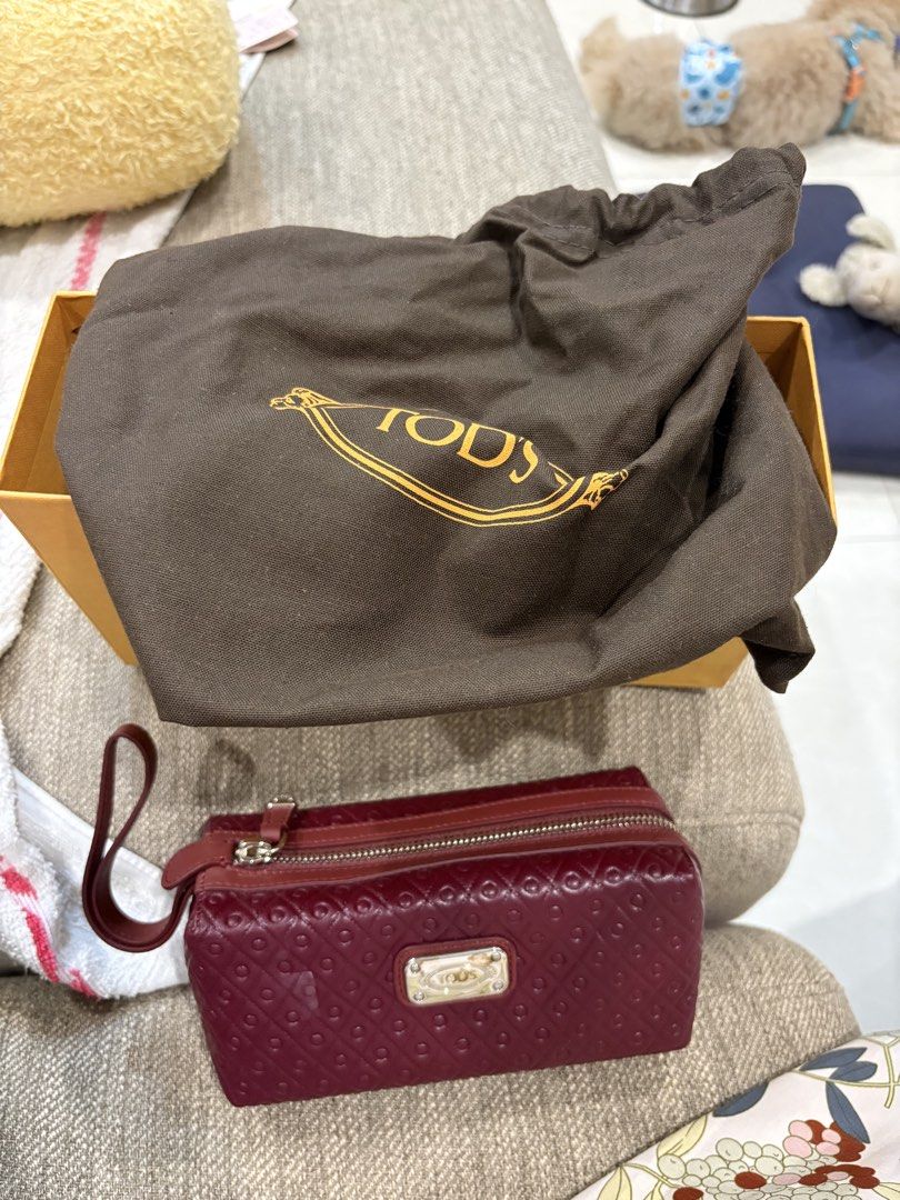Tod's Quilted Leather Clutch (Category: Luxury Bags & Wallets) located in Manila. Submitted by sarahdeclutters88 (Listing ID 1424921021, Image 2). Description: Never used With box and pouch.