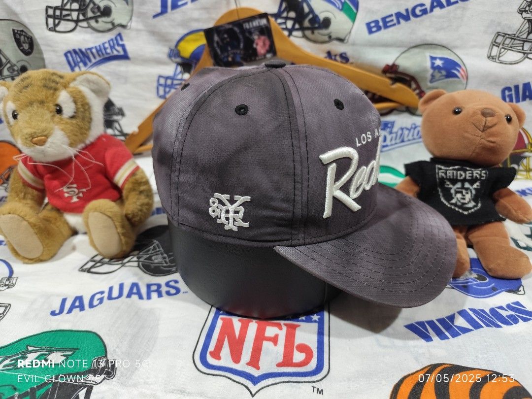 Y&R Los Angeles Reckless Cap (Category: Caps & Hats) located in Baguio. Submitted by FRANKLIN (Listing ID 1424991987, Image 2). Description: Cap features the "Los Angeles Reckless" design. It has a snapback closure and the Y&R logo on the side. The cap's interior has the brand name printed along the seams. The cap is a dark grey color..