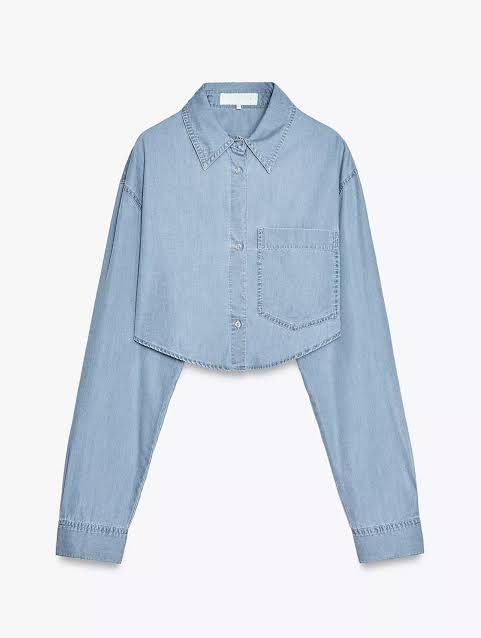 Zara Cropped Denim Shirt (Category: Longsleeves) located in Pasay City. Submitted by ella8922 (Listing ID 1425006299, Image 2). Description: - Zara Cropped Denim Shirt - Size: XS - Condition: Brand new with tags - Design: Cropped style - Material: Soft Denim - Color: Light wash.
