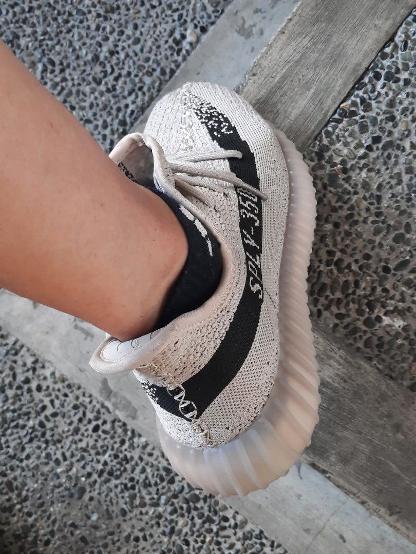 Adidas Yeezy Boost 350 V2 (Category: Sneakers) located in Las Pinas. Submitted by lbays_mint (Listing ID 1424569009, Image 3). Description: - Adidas Yeezy Boost 350 V2 - Neutral colorway/ Beige - Signature side stripe with "SPLY-350" text - Translucent sole - Laced - used once 9/10 condition👍 since it's pointed need larger one photo of inside label to follow..