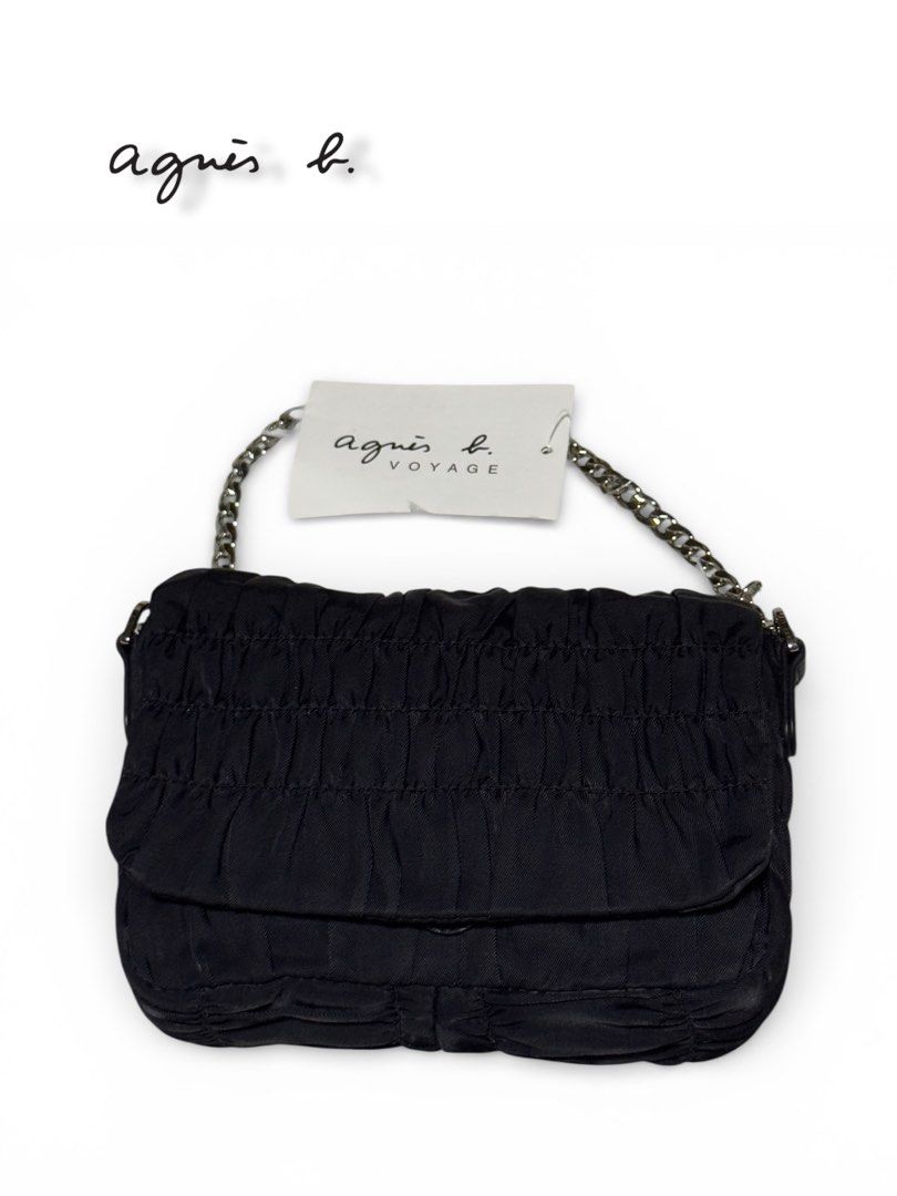 Agnes B. Voyage Black Shoulder Bag (Category: Luxury Bags & Wallets) located in Cebu City. Submitted by gabgaaab (Listing ID 1425149251, Image 3). Description: Agnès b. VOYAGE Ruched Chain Shoulder Bag - Brand New with Tag. - Small shoulder bag or clutch. - Color: Classic black. - Lightweight nylon or synthetic fabric with a satin-like finish. - Polished silver-tone curb chain handle. Dm me for inquiries.
