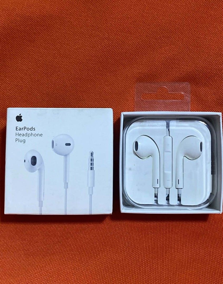 Apple EarPods Headphone Plug (Category: Earphones) located in Manila. Submitted by milasgadgetph (Listing ID 1425190715, Image 1). Description: Genuine Apple EarPods with Headphone Plug. Comes with the original box. The earphones are white. Perfect for listening to music or taking calls. The box shows the Apple logo and the product name. The earphones are in their original packaging..