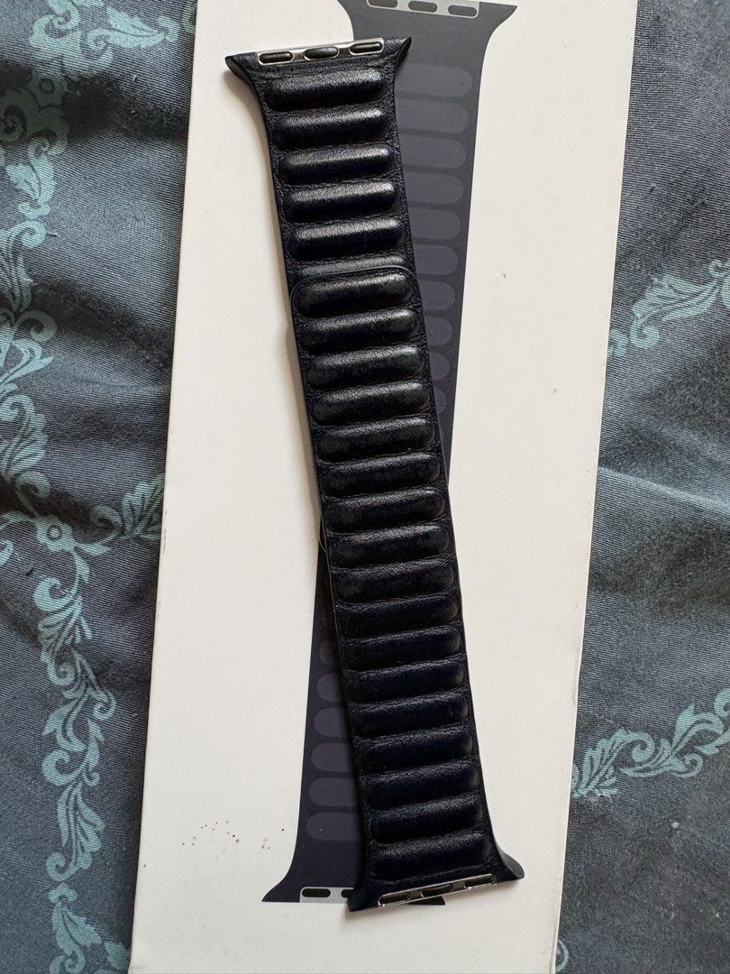 Apple Watch Band - Leather Magnetic (Category: Wearables & Smart Watches) located in Cavite. Submitted by shophoenix (Listing ID 1425060867, Image 2). Description: Genuine Apple Watch band. This is a leather magnetic band. The band is Ink colorway. The size is 41mm/40mm/38mm. .