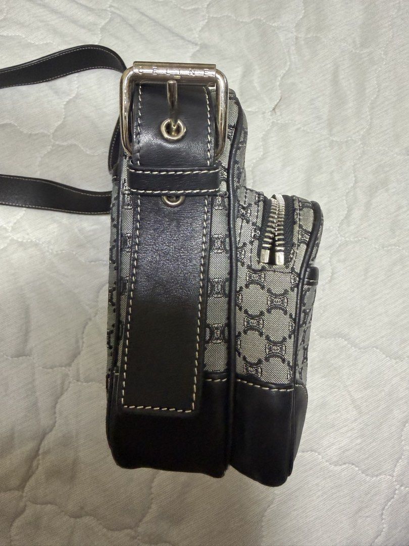 [Decluttering] Authentic Vintage Celine Macadam Shoulder Bag (Category: Luxury Bags & Wallets) located in Mandaluyong City. Submitted by ronportula (Listing ID 1425168878, Image 3). Description: *Decluttering* Celine shoulder bag with the iconic Macadam pattern. Features a black leather strap and trim. The bag has multiple compartments with zipper closures. The Celine logo is visible on the zipper and buckle. Condition: Minor signs of use. Minor 