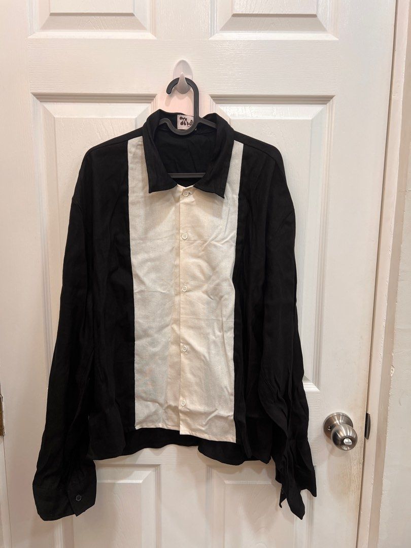 Black/White Miu The Label Polo (Category: Tshirts & Polo Shirts ) located in Bacoor. Submitted by themancaveph (Listing ID 1425142234, Image 1). Description: 60x66cm. Cropped..