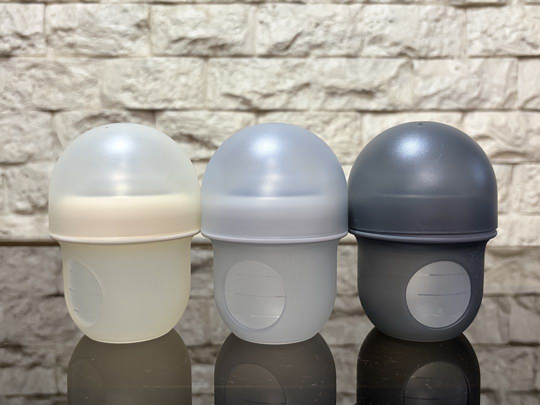 Boon Nursh Bottle Set (Category: Breastfeeding & Bottle Feeding) located in Bacoor. Submitted by aguilariza (Listing ID 1425173719, Image 1). Description: Boon Set of 3 Nursh Silicone Baby Feeding Bottle (with Pouches) 4oz/118ml BPA-Free Gray Shades Nipple 0m+ RFS: ayaw ni LO. Used only 1bottle/nipple to try tho di ko na alam alin dyan 😅 .