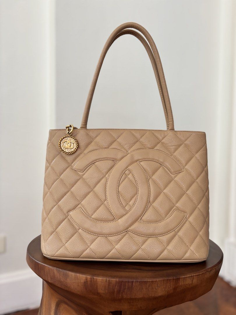 Chanel Medallion Caviar Tote Bag (Category: Luxury Bags & Wallets) located in Muntinlupa City. Submitted by closet.confessions (Listing ID 1425200462, Image 2). Description: A true classic that never goes out of style. ✨ This Chanel Medallion Tote is in beautiful Rank A condition, and finding one in this color and ranking is very rare. Comes with card, generic dustbag & FREE Entrupy certificate .