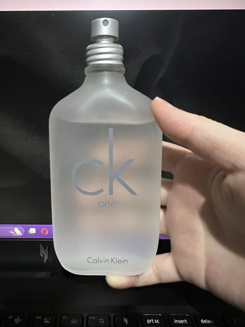 CK One Calvin Klein Eau de Toilette 100ml (Category: Fragrance & Deodorants) located in Manila. Submitted by laviople (Listing ID 1425134043, Image 2). Description: Sira ang sprayer but pede nmn i-decant. 95% full.