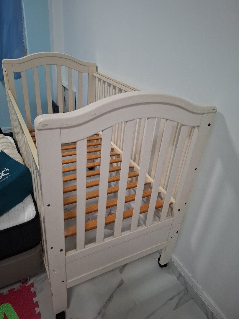 Cot frame (Category: Cots & Cribs) located in Singapore. Submitted by bounciebear (Listing ID 1425061920, Image 1). Description: 75cm x 138cm x 115cm. frame only, mattress not included please arrange for your own mover.