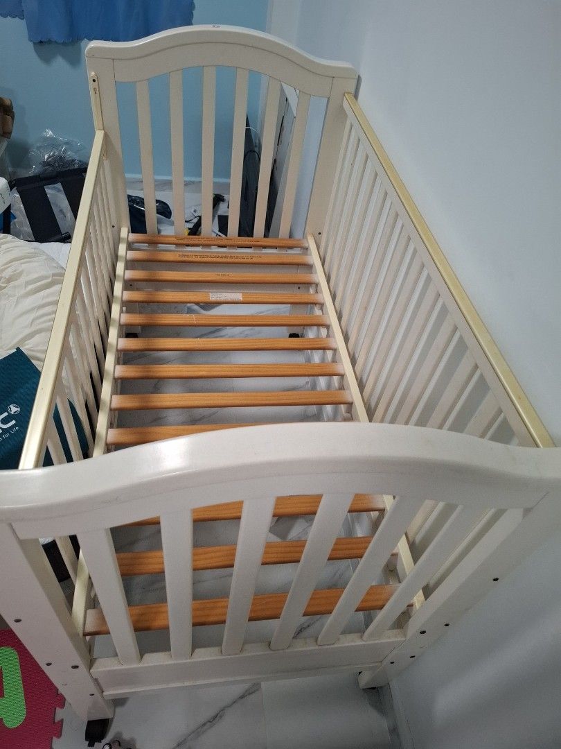 Cot frame (Category: Cots & Cribs) located in Singapore. Submitted by bounciebear (Listing ID 1425061920, Image 2). Description: 75cm x 138cm x 115cm. frame only, mattress not included please arrange for your own mover.