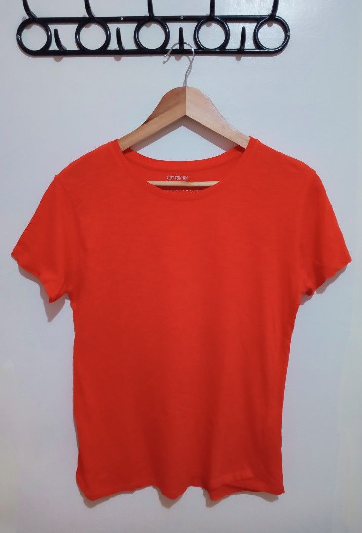Cotton On Orange T-shirt (Category: Shirts) located in Rizal. Submitted by cool.and.lit (Listing ID 1425199190, Image 1). Description: Tonato orange crew neck t-shirt. It has short sleeves and a relaxed fit. It's made of comfortable fabric. It's a versatile piece that can be easily paired with jeans, shorts, or skirts. Perfect for casual wear..