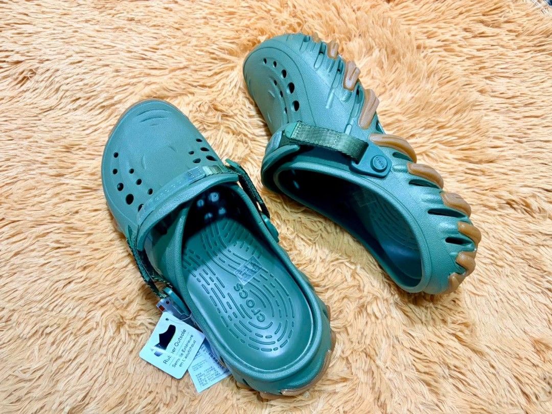 Crocs Echo Gum Sandals (Category: Flats & Sandals) located in Manila. Submitted by munchkinsweet (Listing ID 1425100462, Image 3). Description: These Crocs sandals feature a unique design with a rubber outsole. They have a strap for a secure fit and are available in multiple colors. The sandals have the Crocs logo on the footbed. They appear to be new with tags attached..