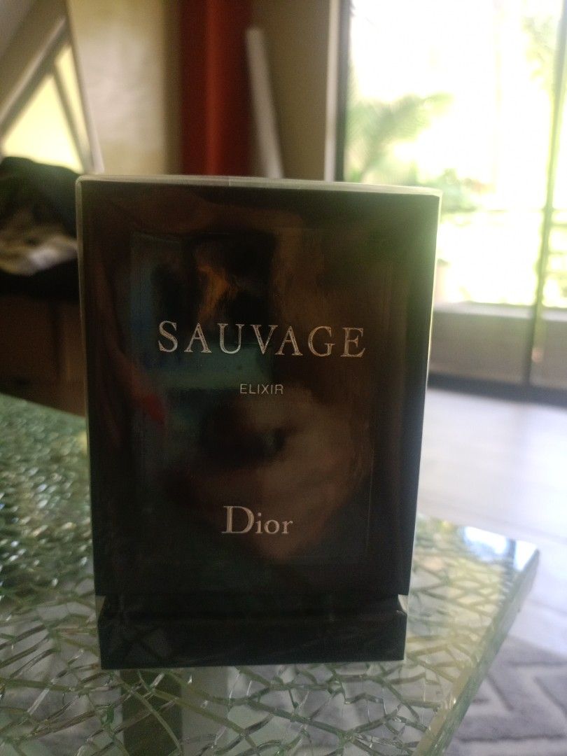 Dior Sauvage Elixir (Category: Fragrance & Deodorants) located in Cebu City. Submitted by cedric- (Listing ID 1425080904, Image 1). Description: Sealed bottle of Dior Sauvage Elixir. The box is black with silver lettering. The top of the box has a Dior logo. The barcode is visible on the bottom of the box..