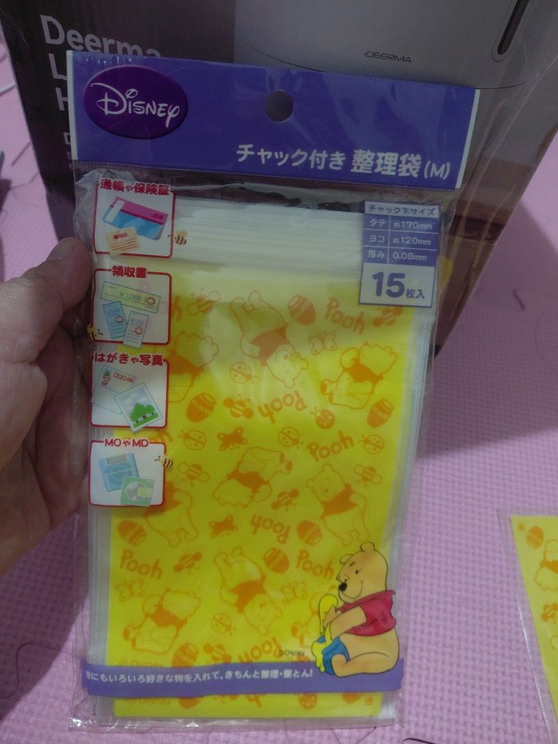 Disney Winnie the Pooh Ziplock (Category: Diaper Bags & Wetbags) located in Manila. Submitted by bashamylove0116 (Listing ID 1425234585, Image 1). Description: These are Disney Winnie the Pooh storage bags. Each pack contains 15 bags. The bags are medium-sized with a zipper closure. The bags feature a yellow background with Winnie the Pooh and other designs. The packaging has Japanese text..