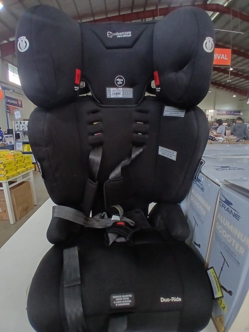 Duo-Ride Car Seat (Category: Car Seats) located in Manila. Submitted by sc_arvin (Listing ID 1425103671, Image 1). Description: Black Duo-Ride car seat. Features a headrest, back support, and seat cushion. Includes safety straps. The car seat has a logo on the backrest..