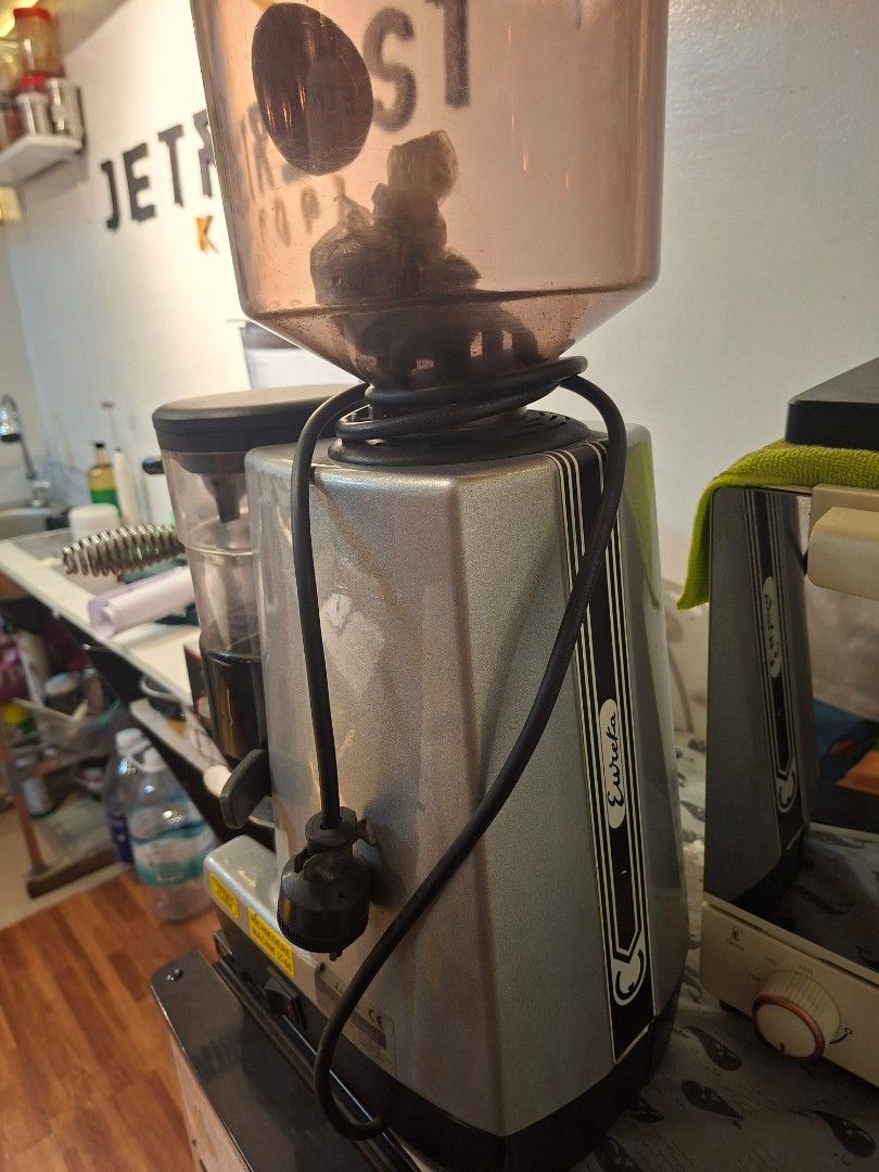 Eureka Professional Coffee Grinder (Category: Coffee Machines & Makers) located in Caloocan City. Submitted by jethroww.gascon17 (Listing ID 1425108516, Image 3). Description: For Sale Eureka Mondial Commercial professional Coffee bar Grinder with doser 450grams and tamper original came from italy 2kg hopper 65mm flar burr good for espresso, pour over, brewing sizes. 1330rpm 220v outlet 280watts issue: need to rewind motor to more faster grinding