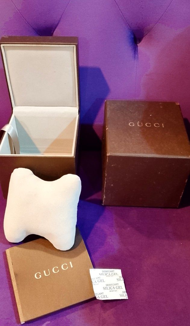 Gucci Watch Box with Accessories (Category: Luxury Watches) located in Cabanatuan. Submitted by miss.maia (Listing ID 1425233241, Image 2). Description: Authentic Gucci watch box set. Includes the outer box, inner box, watch pillow, and booklet. The box is brown with the Gucci logo on the top. The inner box has a beige interior. The booklet is also included. Perfect for storing or gifting a Gucci watch. Nego for sure buyer! add sf.