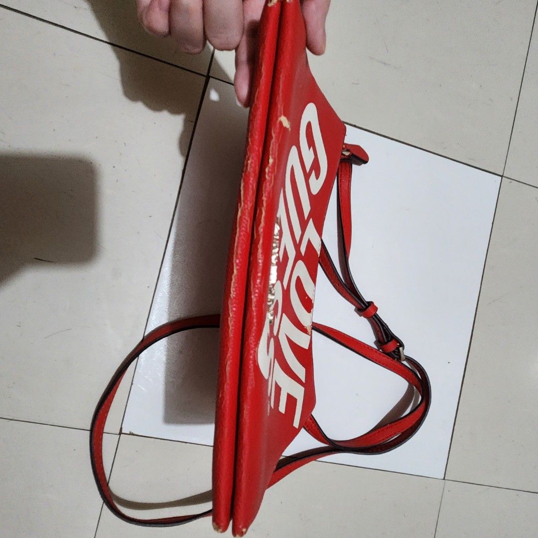 Guess Love Crossbody Bag (Category: Cross-body Bags) located in Manila. Submitted by my_things (Listing ID 1425209626, Image 3). Description: cracks and scratches on the bag with 2 big zipper compartments and magnetic closure in between .