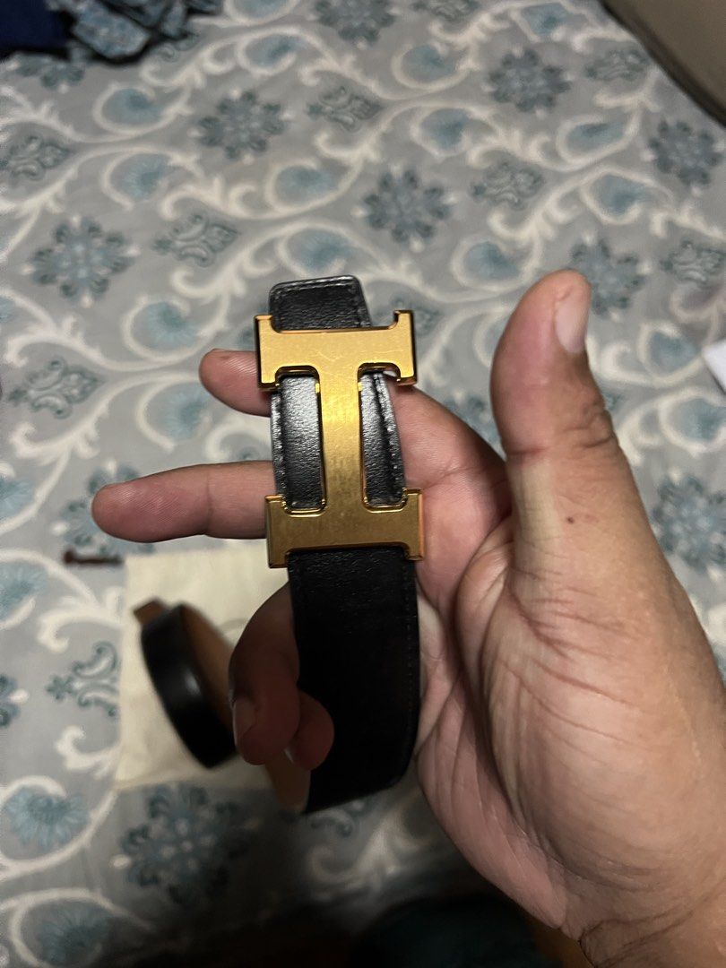 Hermes Reversible Belt with Gold Buckle (Category: Belts) located in Cavite. Submitted by budoy07 (Listing ID 1425122137, Image 2). Description: Hermes belt features a reversible design with a black exterior and a brown interior. Negotiable.